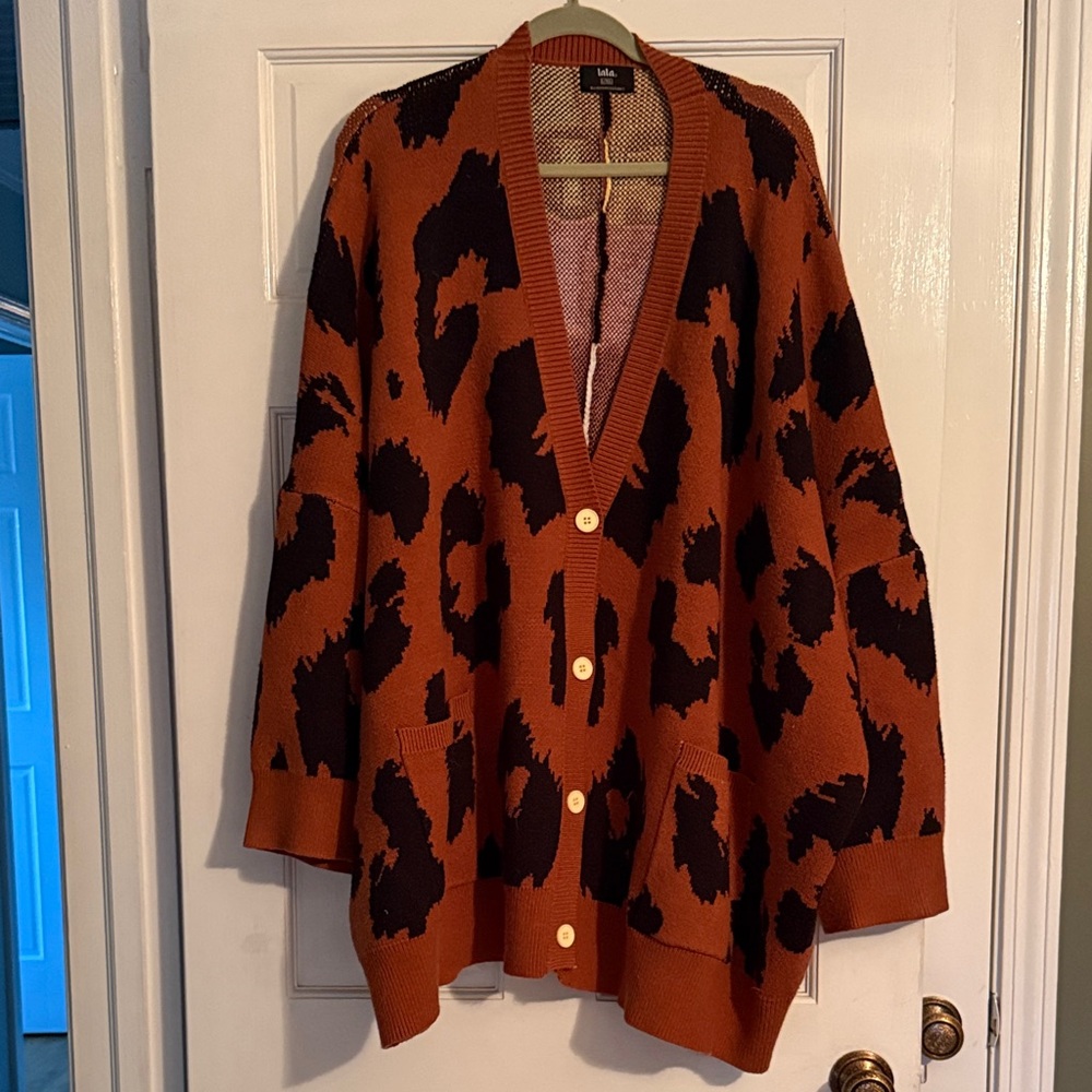 Dressed in LALA Orange and Black Cat Cardigan